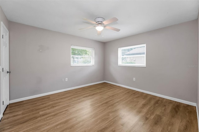 607 Spring Blossom Ct, Brandon, FL 33511 - spare room with ceiling fan and wood finished floors