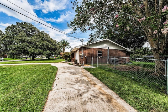 607 Spring Blossom Ct, Brandon, FL 33511 - view of side of property featuring brick siding and concrete driveway