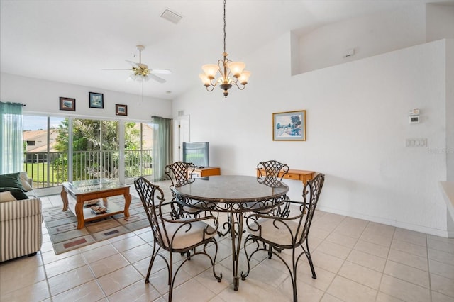 7018 Scrub Jay Way, Bradenton, FL 34203 - dining room with a ceiling fan, light tile patterned floors, and a chandelier