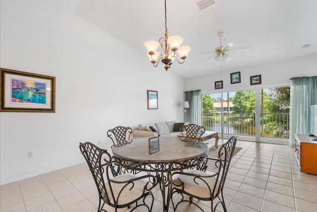 7018 Scrub Jay Way, Bradenton, FL 34203 - dining room featuring ceiling fan, light tile patterned floors, a chandelier, and high vaulted ceiling