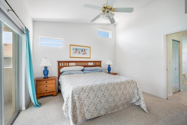 7018 Scrub Jay Way, Bradenton, FL 34203 - bedroom with light colored carpet and ceiling fan