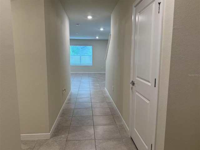 905 Rivers Crossing St, Clermont, FL 34714 - corridor with light tile patterned floors and recessed lighting