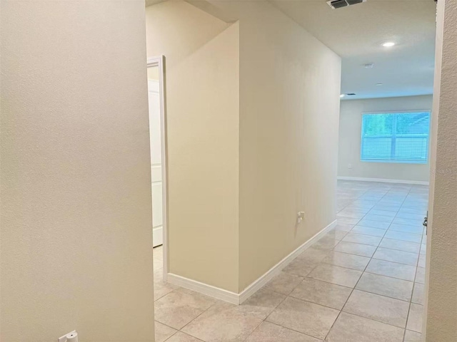 905 Rivers Crossing St, Clermont, FL 34714 - hallway featuring light tile patterned floors and recessed lighting