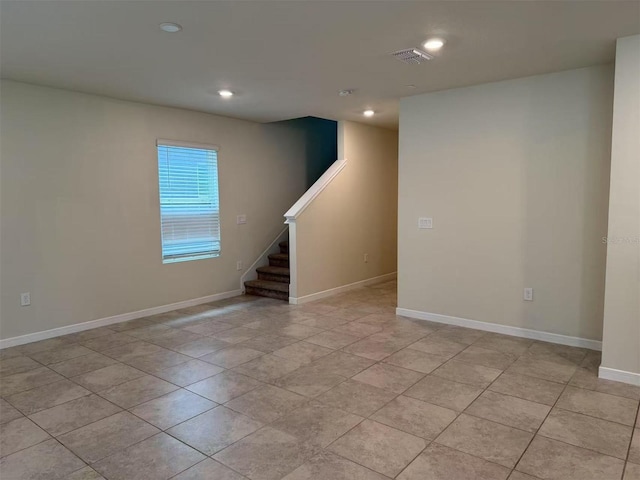 905 Rivers Crossing St, Clermont, FL 34714 - empty room with stairs, light tile patterned floors, and recessed lighting