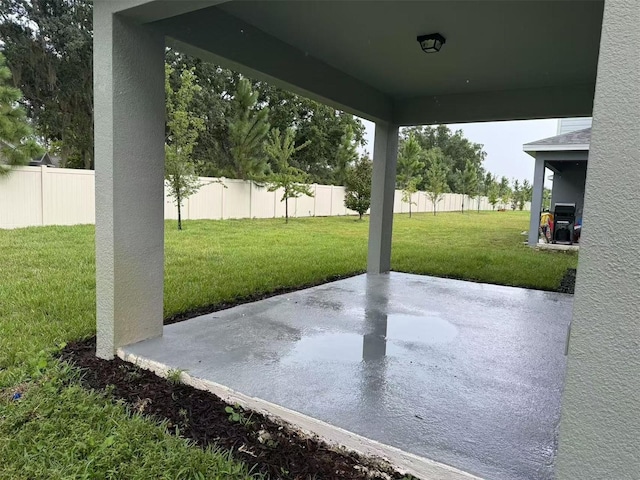 905 Rivers Crossing St, Clermont, FL 34714 - fenced backyard featuring a patio area