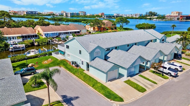 9410 Tara Cay Ct Unit 15, Seminole, FL 33776 - aerial view of residential area featuring a large body of water