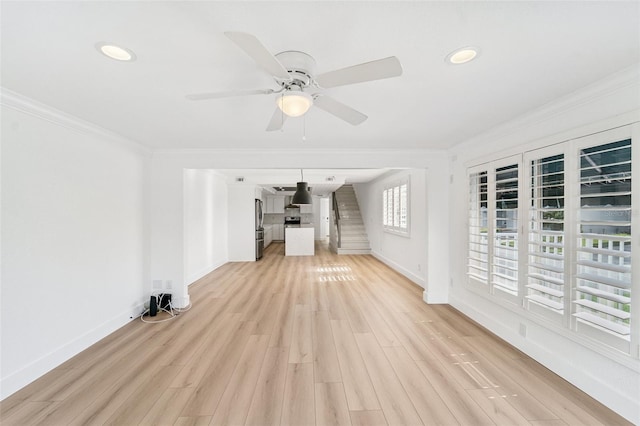 9410 Tara Cay Ct Unit 15, Seminole, FL 33776 - unfurnished living room featuring light wood-type flooring, a ceiling fan, crown molding, and recessed lighting