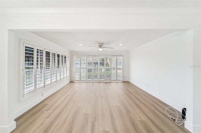 9410 Tara Cay Ct Unit 15, Seminole, FL 33776 - empty room featuring light wood-style flooring, crown molding, a ceiling fan, and recessed lighting