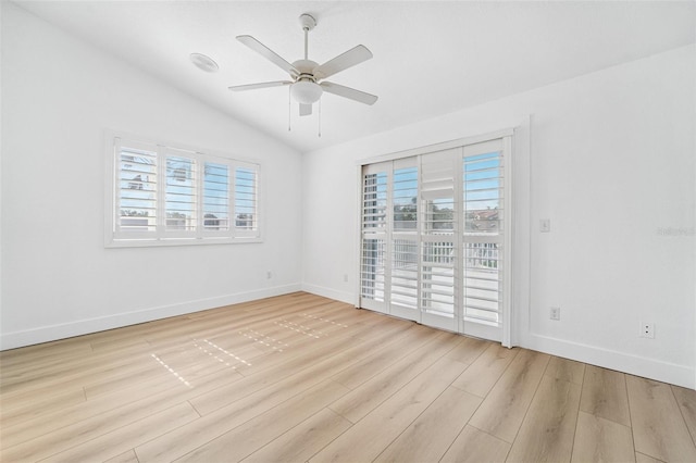 9410 Tara Cay Ct Unit 15, Seminole, FL 33776 - empty room with vaulted ceiling, light wood-type flooring, and a ceiling fan