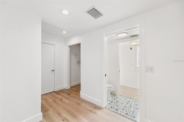 9410 Tara Cay Ct Unit 15, Seminole, FL 33776 - hall featuring recessed lighting and light wood finished floors
