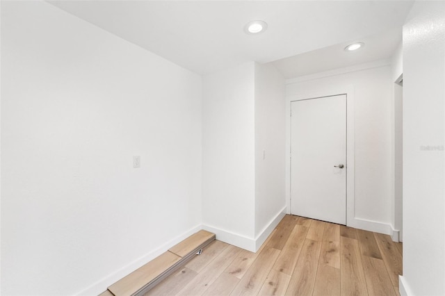 9410 Tara Cay Ct Unit 15, Seminole, FL 33776 - spare room with light wood-style flooring and recessed lighting