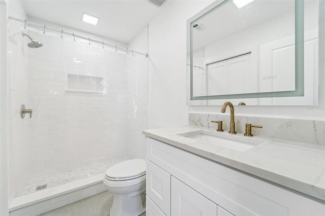 9410 Tara Cay Ct Unit 15, Seminole, FL 33776 - bathroom featuring vanity and a tile shower