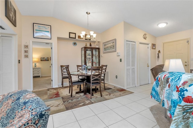 5319 Cordova Way S, Saint Petersburg, FL 33712 - tiled dining room with lofted ceiling and a chandelier