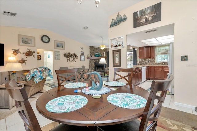 5319 Cordova Way S, Saint Petersburg, FL 33712 - dining space with lofted ceiling, light tile patterned floors, and ceiling fan