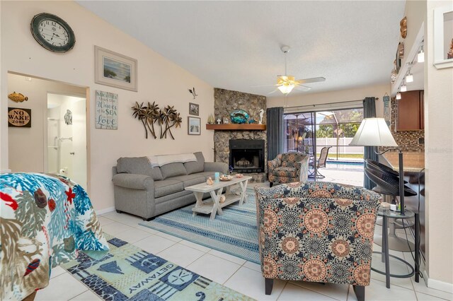 5319 Cordova Way S, Saint Petersburg, FL 33712 - living area featuring ceiling fan, light tile patterned floors, and a fireplace