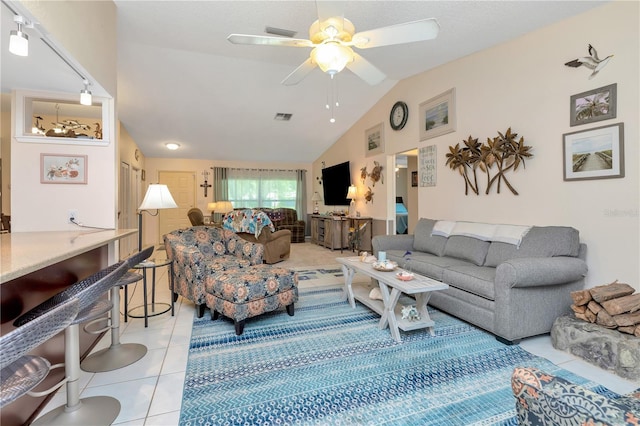5319 Cordova Way S, Saint Petersburg, FL 33712 - living area with light tile patterned floors, lofted ceiling, and a ceiling fan