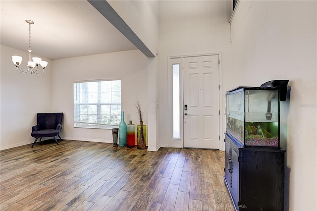 10146 Tuscan Sun Ave, Riverview, FL 33578 - entryway featuring wood finished floors and a chandelier
