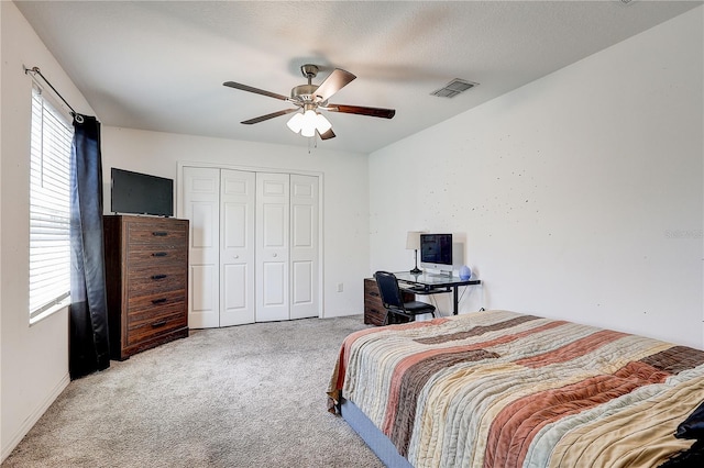 10146 Tuscan Sun Ave, Riverview, FL 33578 - carpeted bedroom with a closet and a ceiling fan