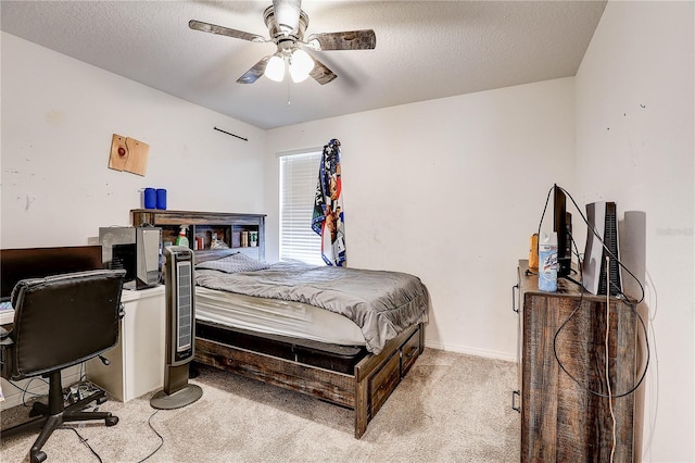 10146 Tuscan Sun Ave, Riverview, FL 33578 - bedroom with light colored carpet, ceiling fan, and a textured ceiling