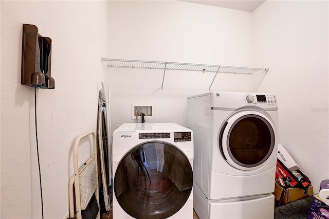 10146 Tuscan Sun Ave, Riverview, FL 33578 - laundry room with washing machine and clothes dryer