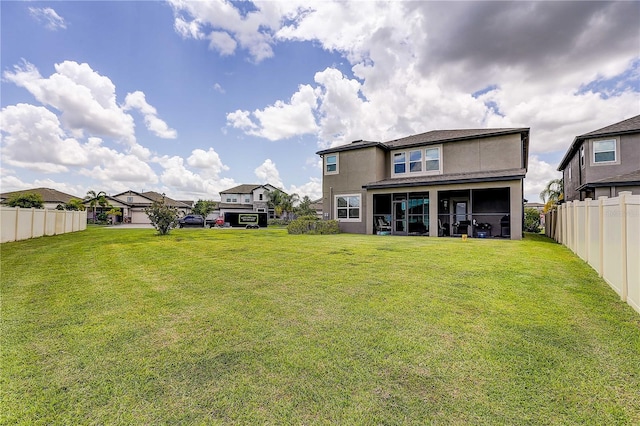 10146 Tuscan Sun Ave, Riverview, FL 33578 - back of house featuring stucco siding and a sunroom