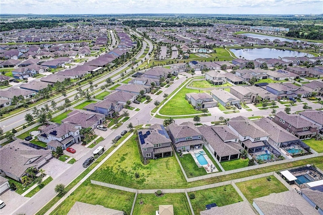 10146 Tuscan Sun Ave, Riverview, FL 33578 - aerial view of residential area featuring a large body of water