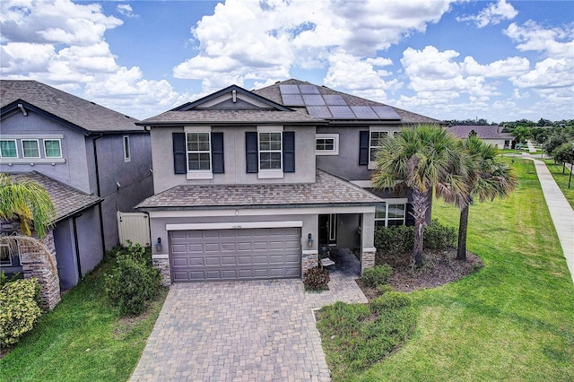 10146 Tuscan Sun Ave, Riverview, FL 33578 - traditional-style home with stucco siding, a front yard, roof mounted solar panels, and a garage
