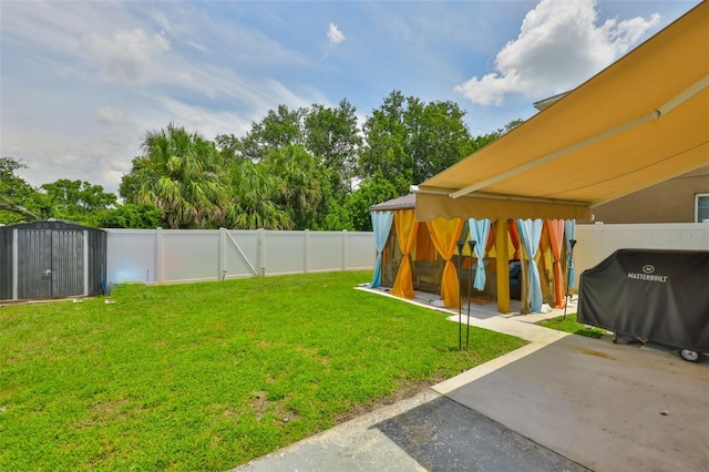 6314 Magnolia Trails Ln, Gibsonton, FL 33534 - fenced backyard featuring a patio and a storage shed