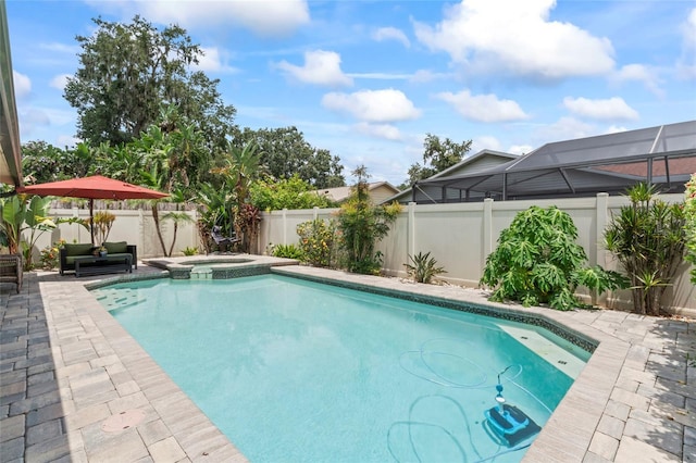 1008 Mallow Way, Brandon, FL 33510 - view of swimming pool with a fenced backyard, a patio, and a pool with connected hot tub
