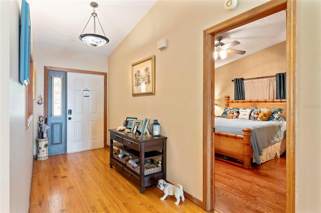 1008 Mallow Way, Brandon, FL 33510 - foyer entrance with light wood-style floors and ceiling fan