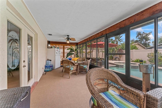 1008 Mallow Way, Brandon, FL 33510 - sunroom / solarium with a jacuzzi, a ceiling fan, outdoor lounge area, and outdoor dining area