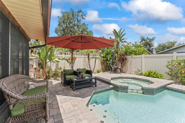 1008 Mallow Way, Brandon, FL 33510 - view of pool with a patio area, a fenced backyard, a pool with connected hot tub, and outdoor lounge area