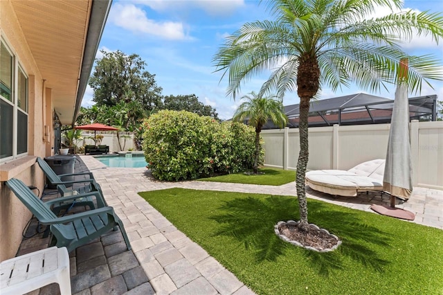 1008 Mallow Way, Brandon, FL 33510 - fenced backyard with a patio