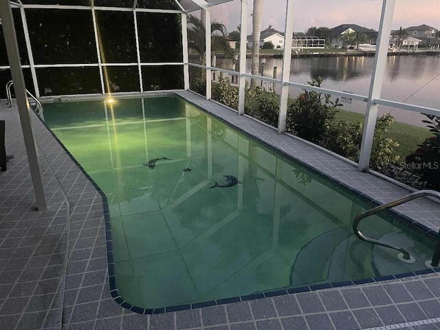 2569 Brazilia Ct, Punta Gorda, FL 33950 - swimming pool with a water view and a lanai