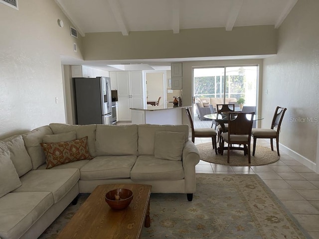 2569 Brazilia Ct, Punta Gorda, FL 33950 - living area with light tile patterned floors and baseboards
