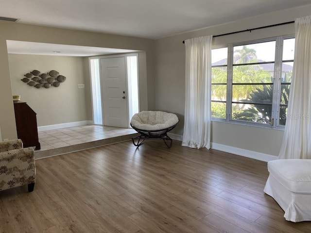 2569 Brazilia Ct, Punta Gorda, FL 33950 - entryway featuring baseboards and wood finished floors