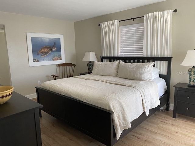 2569 Brazilia Ct, Punta Gorda, FL 33950 - bedroom featuring light wood-style flooring and baseboards