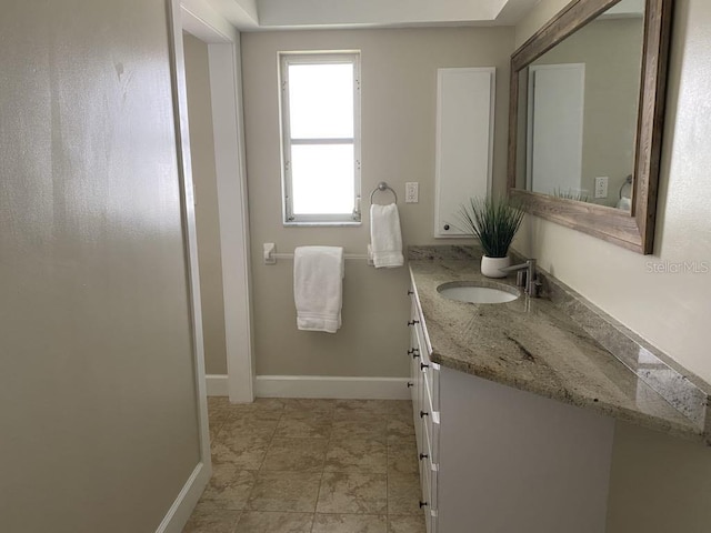 2569 Brazilia Ct, Punta Gorda, FL 33950 - bathroom featuring vanity and baseboards