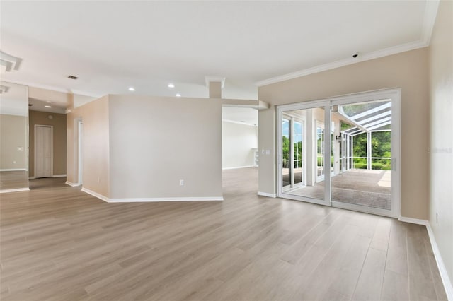5321 Silver Charm Ter, Wesley Chapel, FL 33544 - spare room with ornamental molding, light wood-style flooring, and recessed lighting