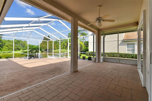 5321 Silver Charm Ter, Wesley Chapel, FL 33544 - unfurnished sunroom with a ceiling fan