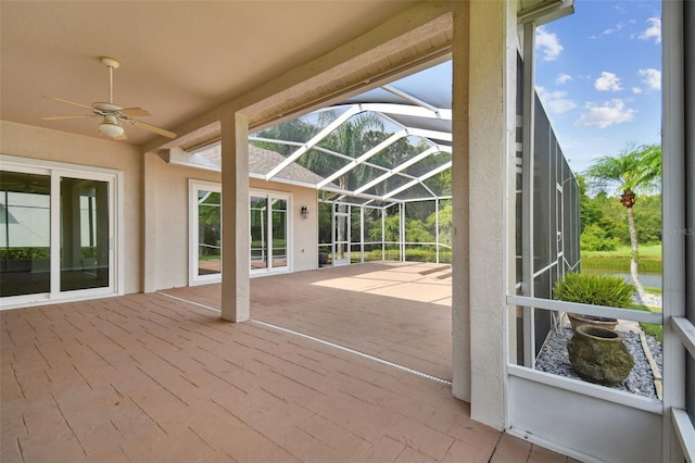 5321 Silver Charm Ter, Wesley Chapel, FL 33544 - unfurnished sunroom with a ceiling fan