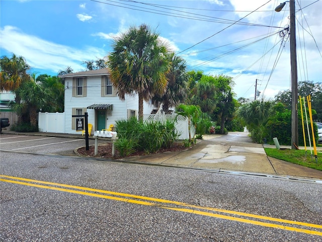1205 Omaha Cir, Palm Harbor, FL 34683 - view of asphalt road with street lights