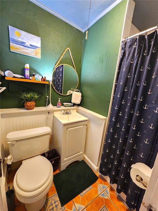 1205 Omaha Cir, Palm Harbor, FL 34683 - full bath with ornamental molding, vanity, wainscoting, tile patterned floors, and a shower with shower curtain