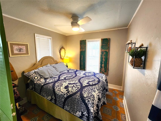 1205 Omaha Cir, Palm Harbor, FL 34683 - bedroom featuring ornamental molding, a textured ceiling, ceiling fan, and tile patterned floors