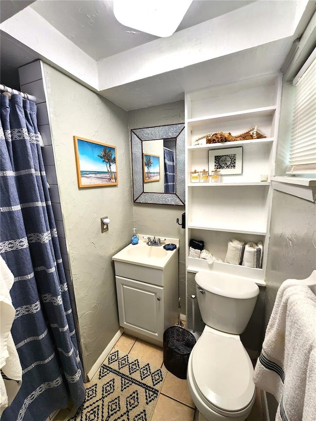 1205 Omaha Cir, Palm Harbor, FL 34683 - bathroom featuring a textured wall, tile patterned flooring, vanity, and curtained shower