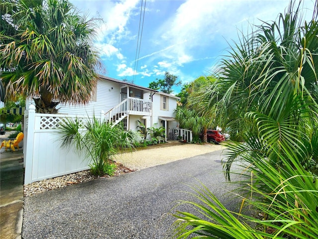 1205 Omaha Cir, Palm Harbor, FL 34683 - view of front facade featuring stairway