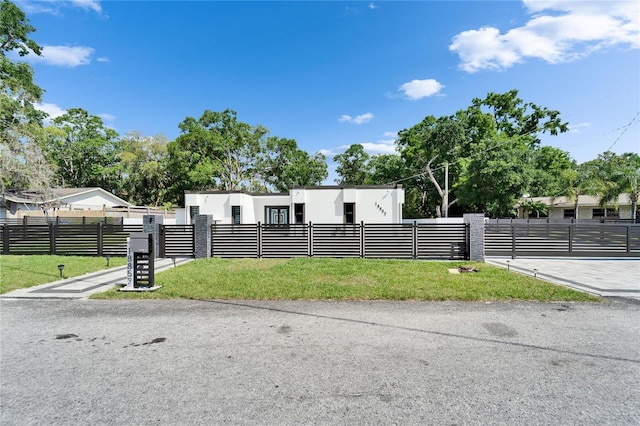 18852 Tracer Dr, Lutz, FL 33549 - modern home with a fenced front yard