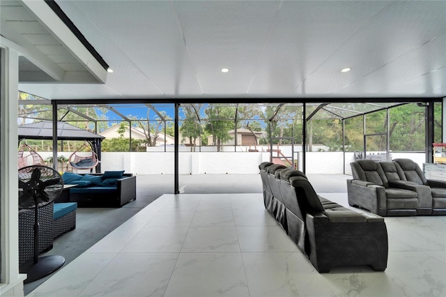 18852 Tracer Dr, Lutz, FL 33549 - lobby with expansive windows, a sunroom, and recessed lighting