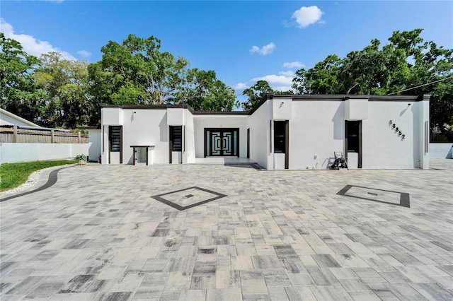 18852 Tracer Dr, Lutz, FL 33549 - view of front facade with stucco siding