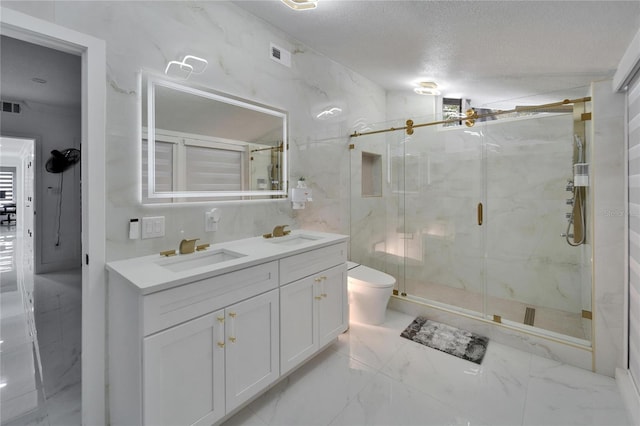 18852 Tracer Dr, Lutz, FL 33549 - bathroom with double vanity, a marble finish shower, and a textured ceiling